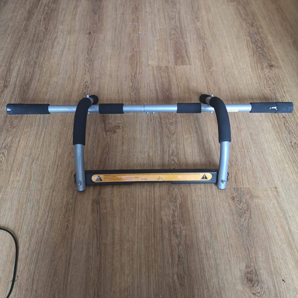 pull up bar on a wooden floor