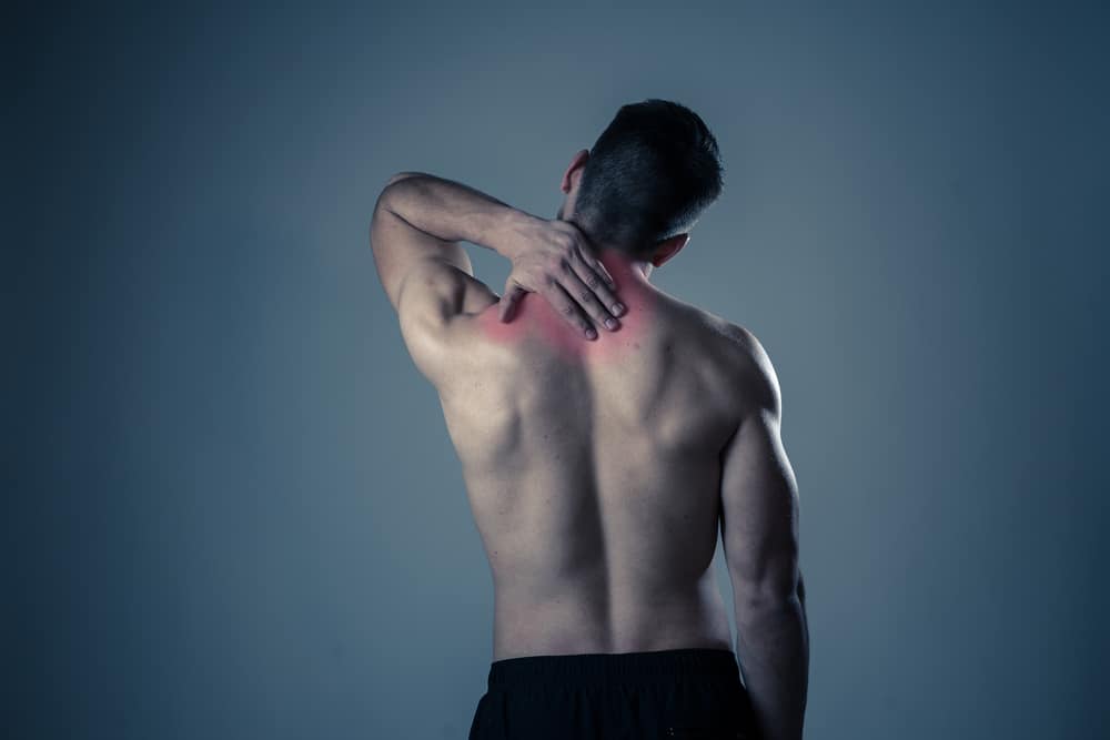 Man with upper back pain